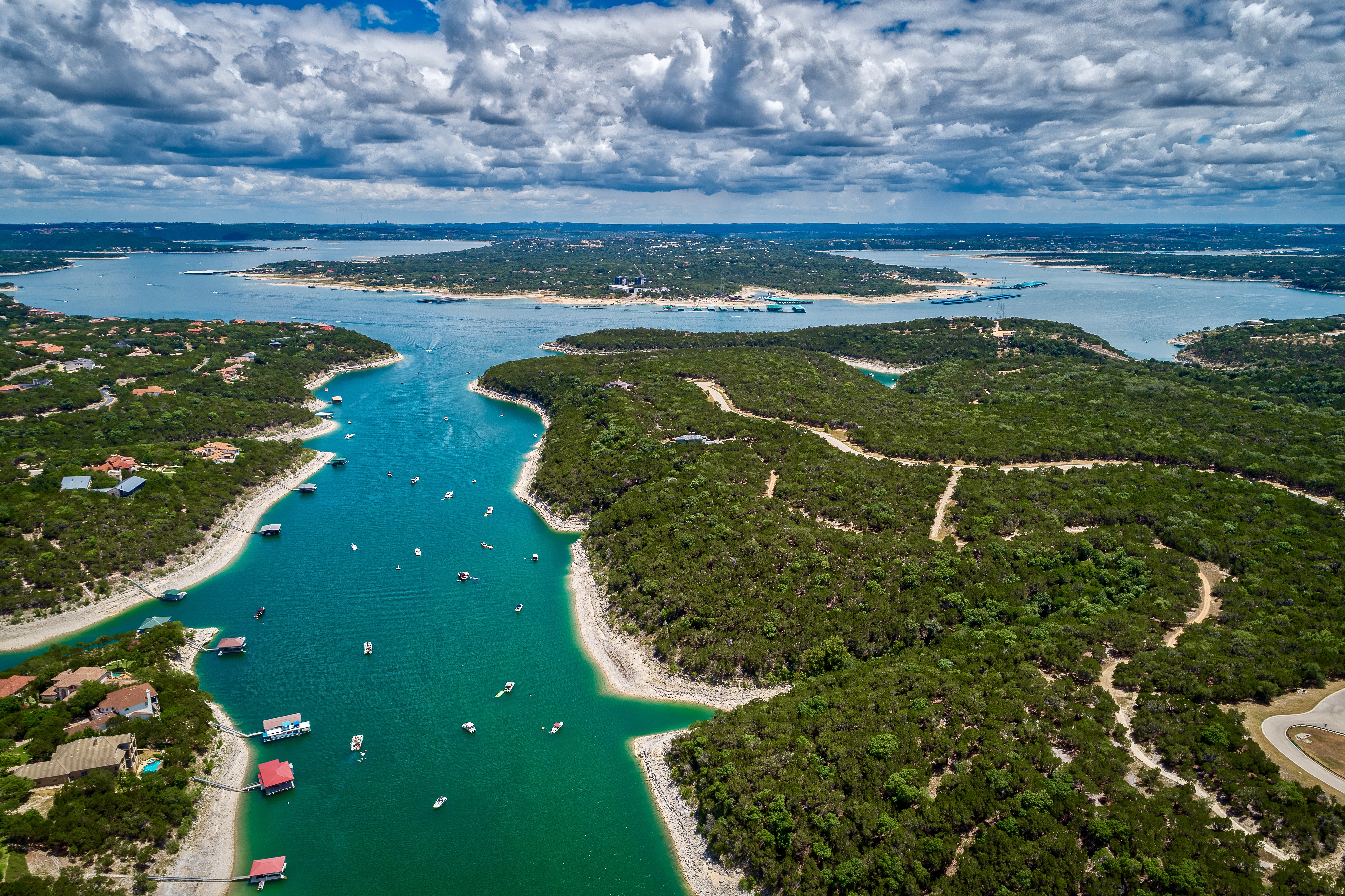 Aerial view of boats on the water, launching a boat from a boat ramp concept. 