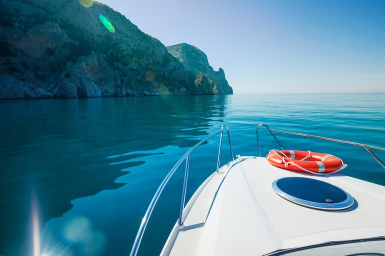 Close-up of a boat hull on calm waters; can I use my boat license in another state concept?