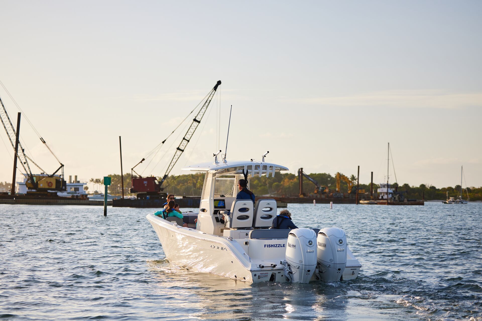 A person operating a boat on the water, Lake of the Ozarks concept. 